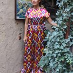Bright colorful woman jumpsuit made of beautiful natural vintage silk for summer time